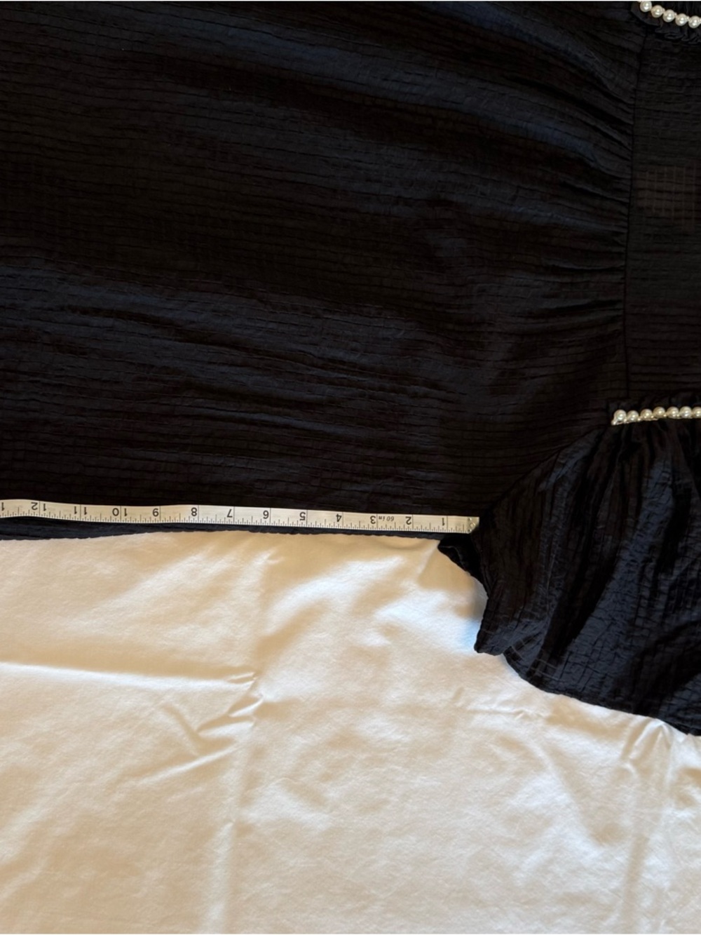 Feminine flowy top from Entro.  Black Ruffle Sleeve Blouse with Pearl Trim - Picture 13 of 14